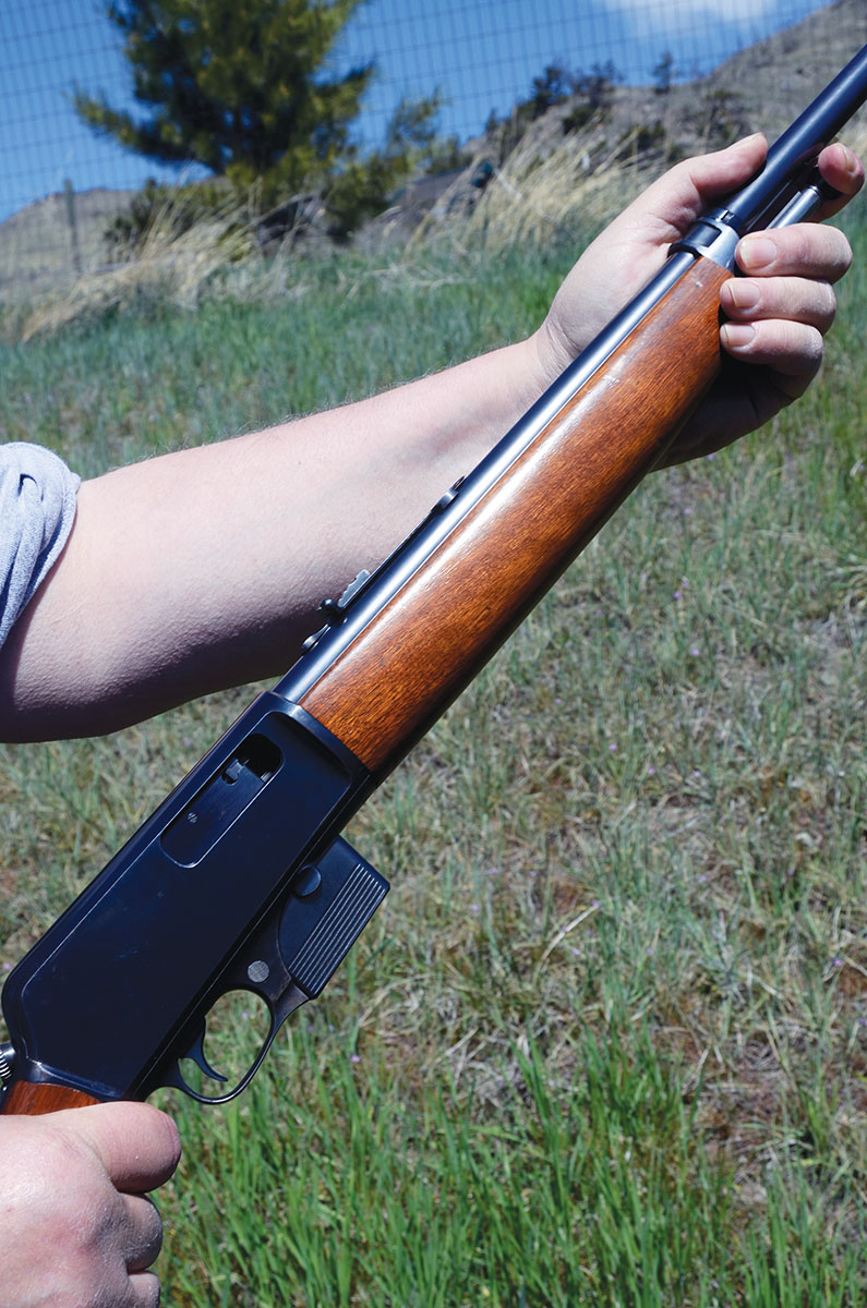 The bolt of a Winchester WSL was retracted by pushing back on the rod extending from the forearm.